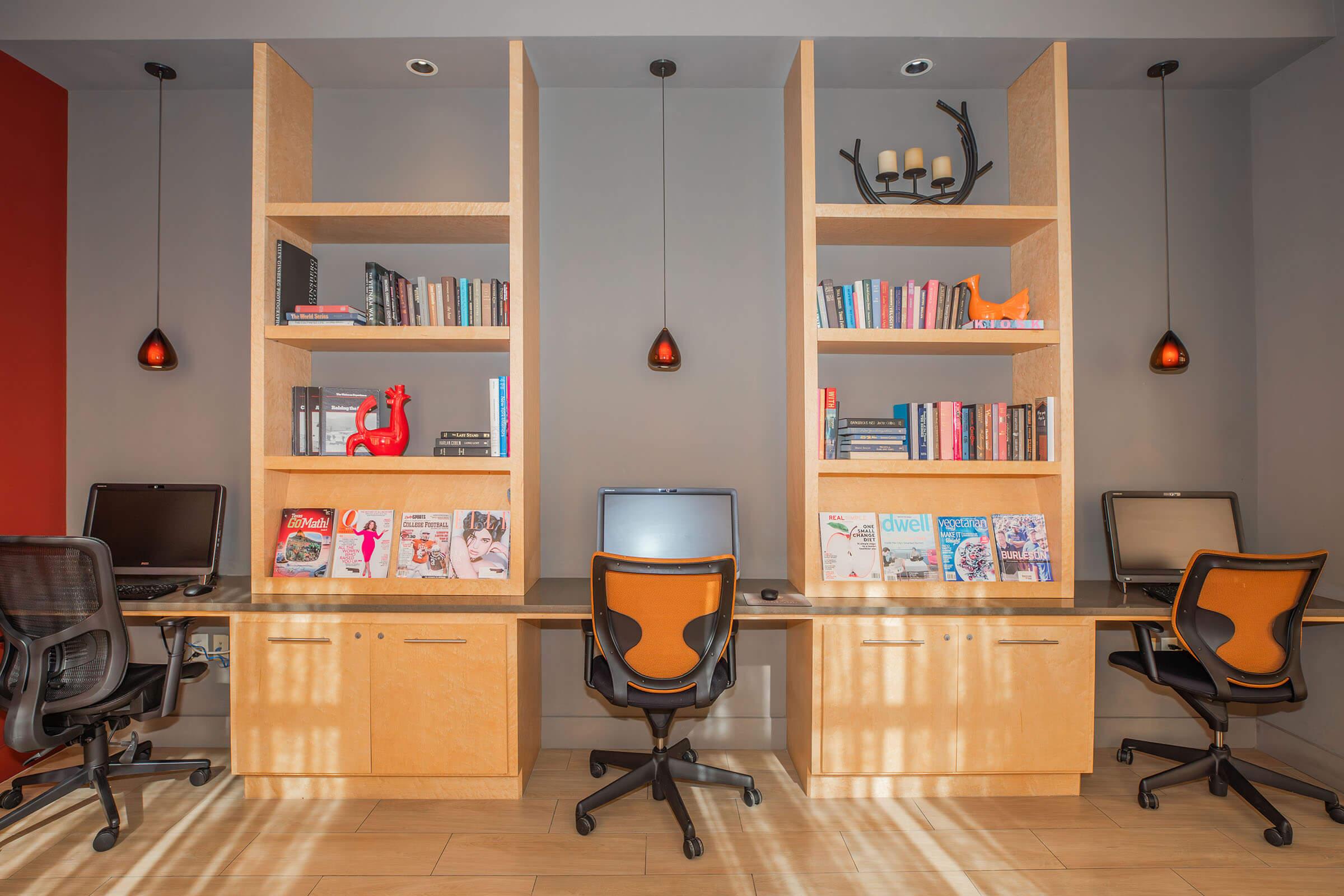 a room filled with furniture and a book shelf