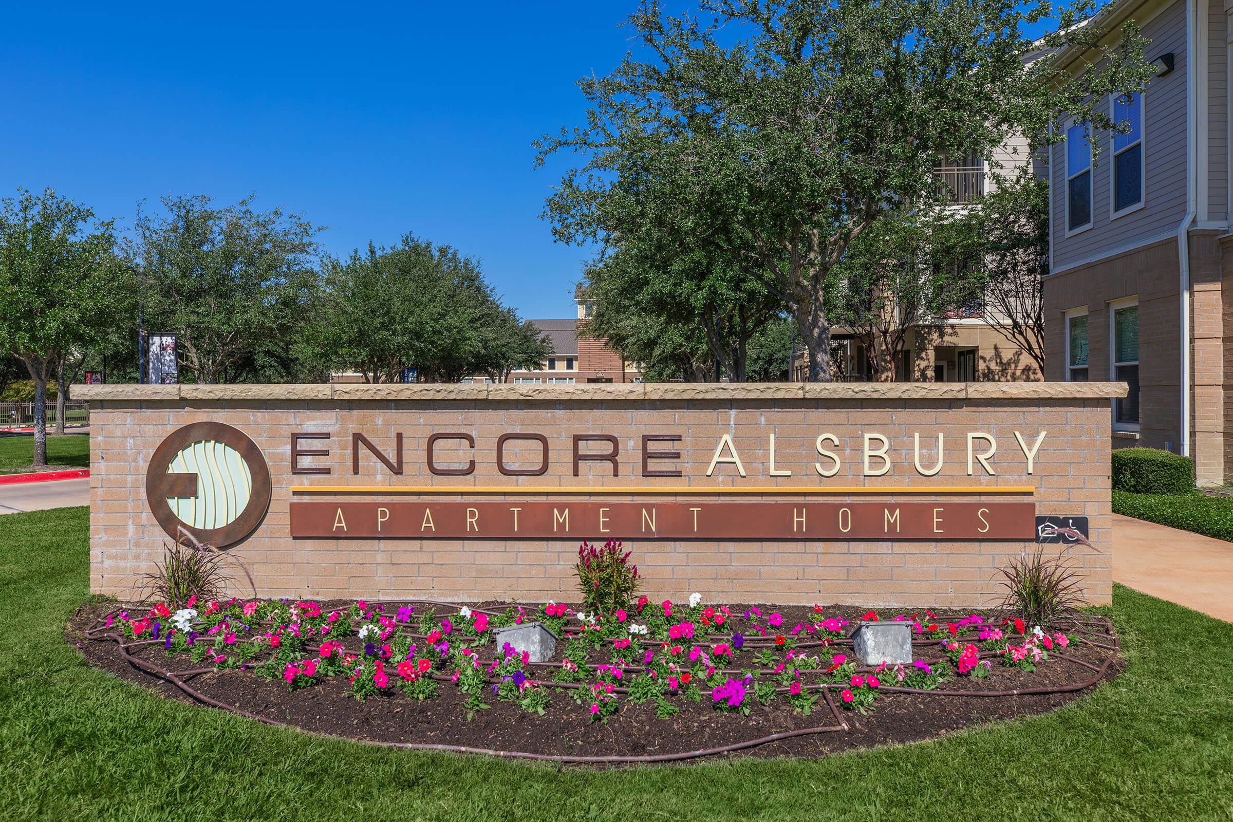 a sign in front of a building