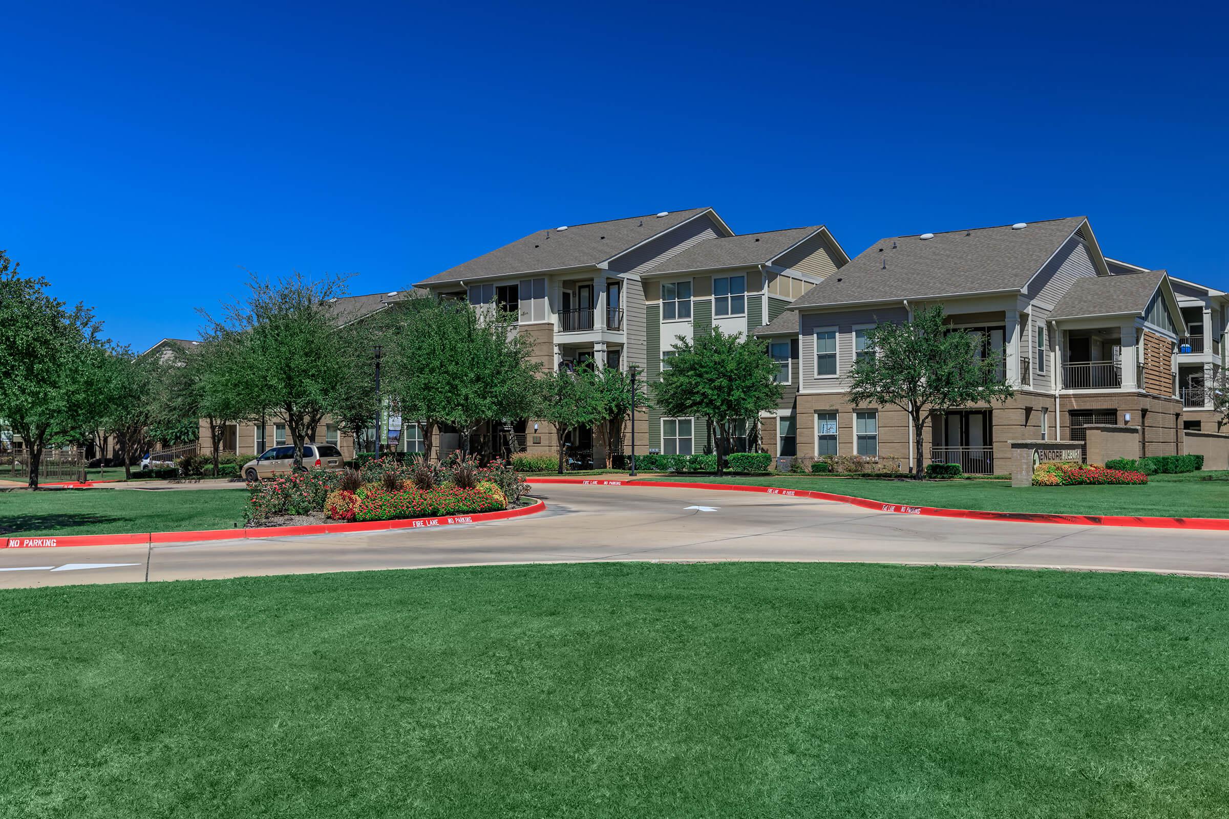 a large lawn in front of a house