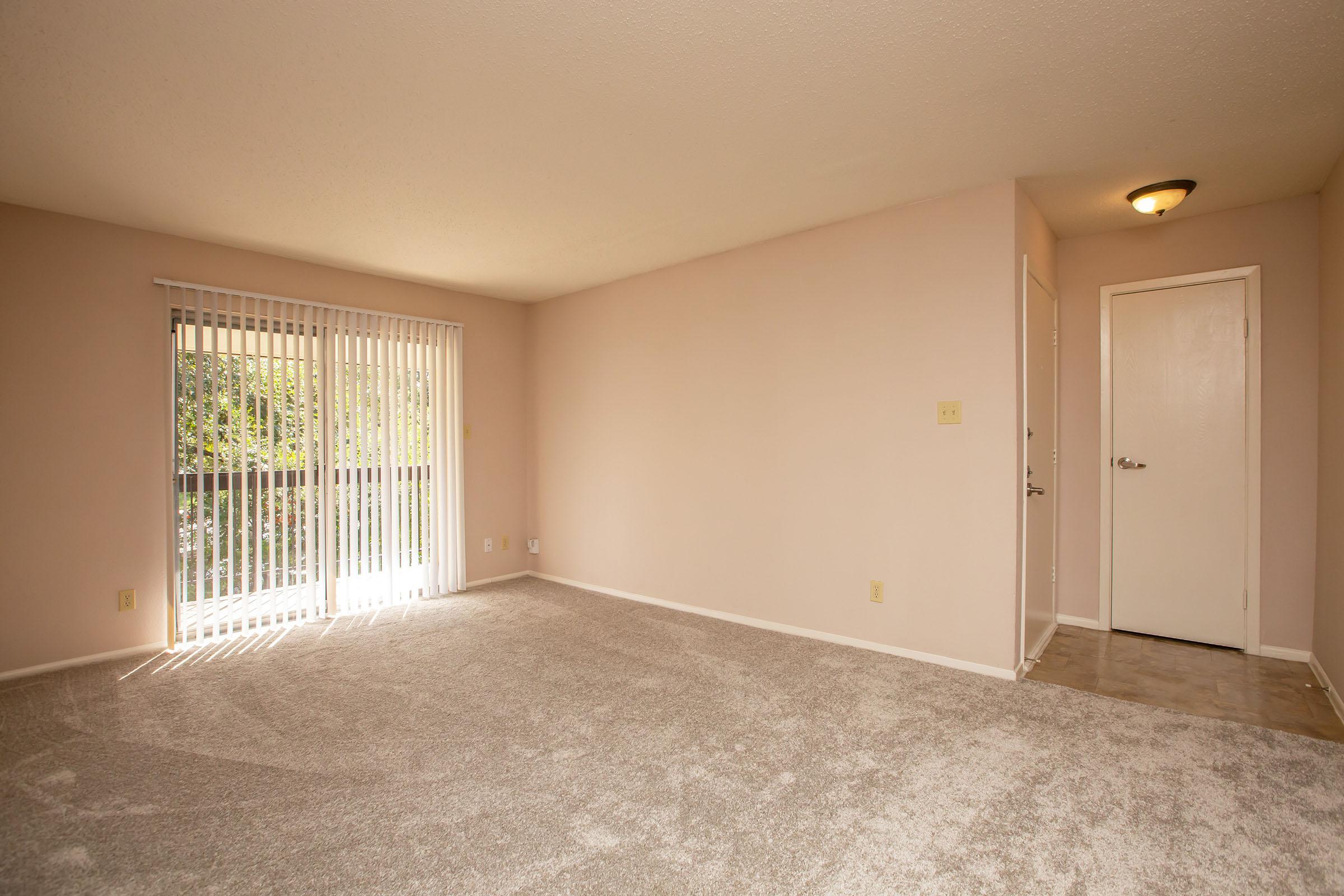 a bedroom with a bed in a room