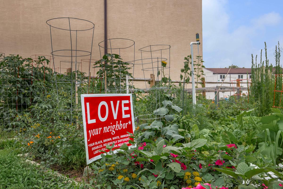 a sign in a garden