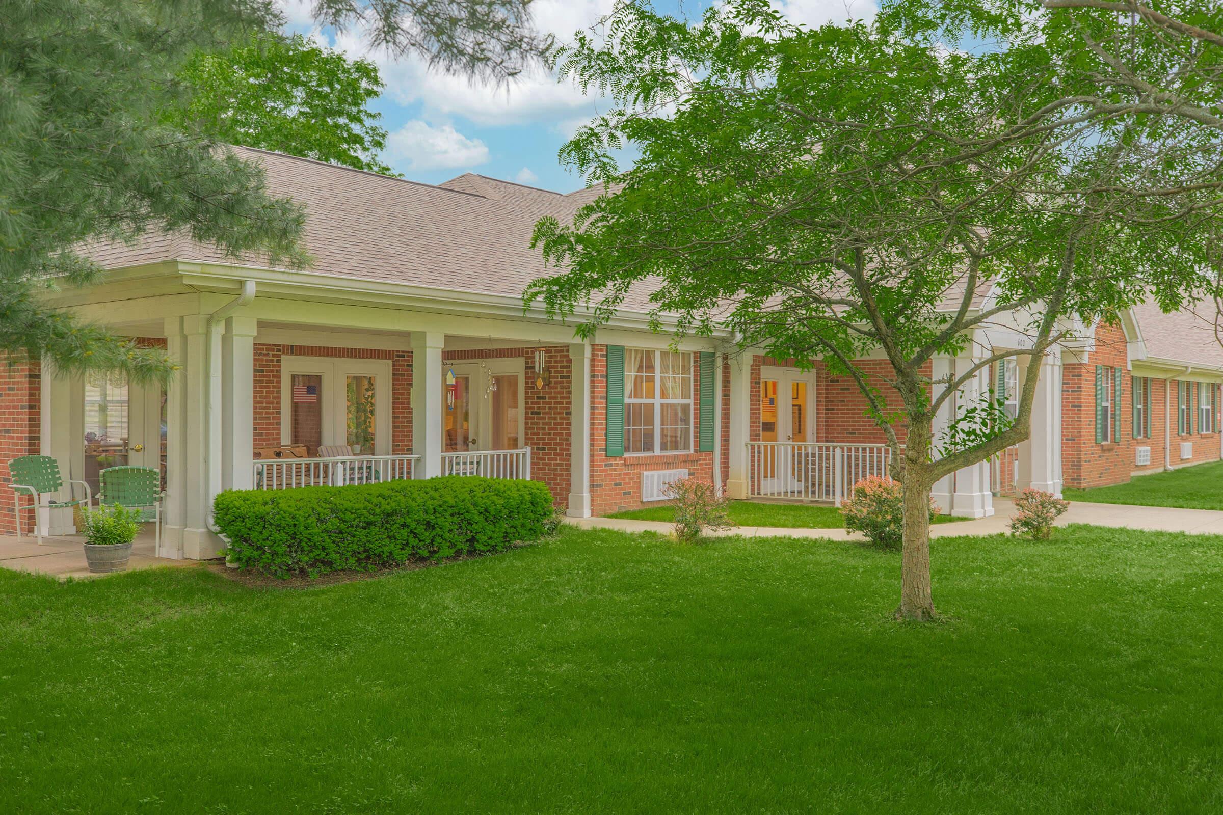 a large lawn in front of a house