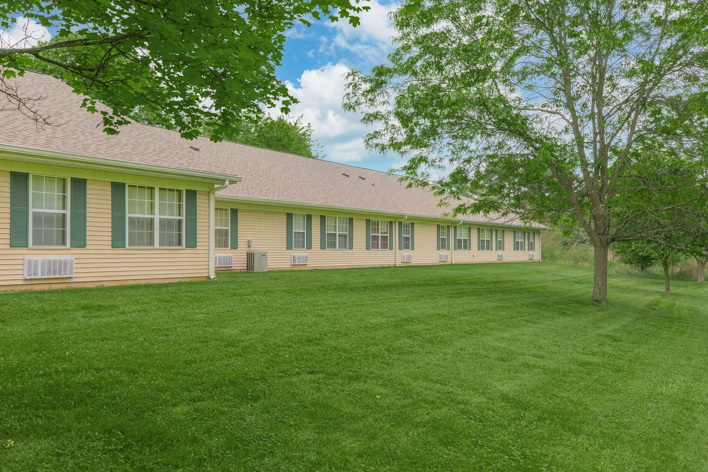 a large lawn in front of a house