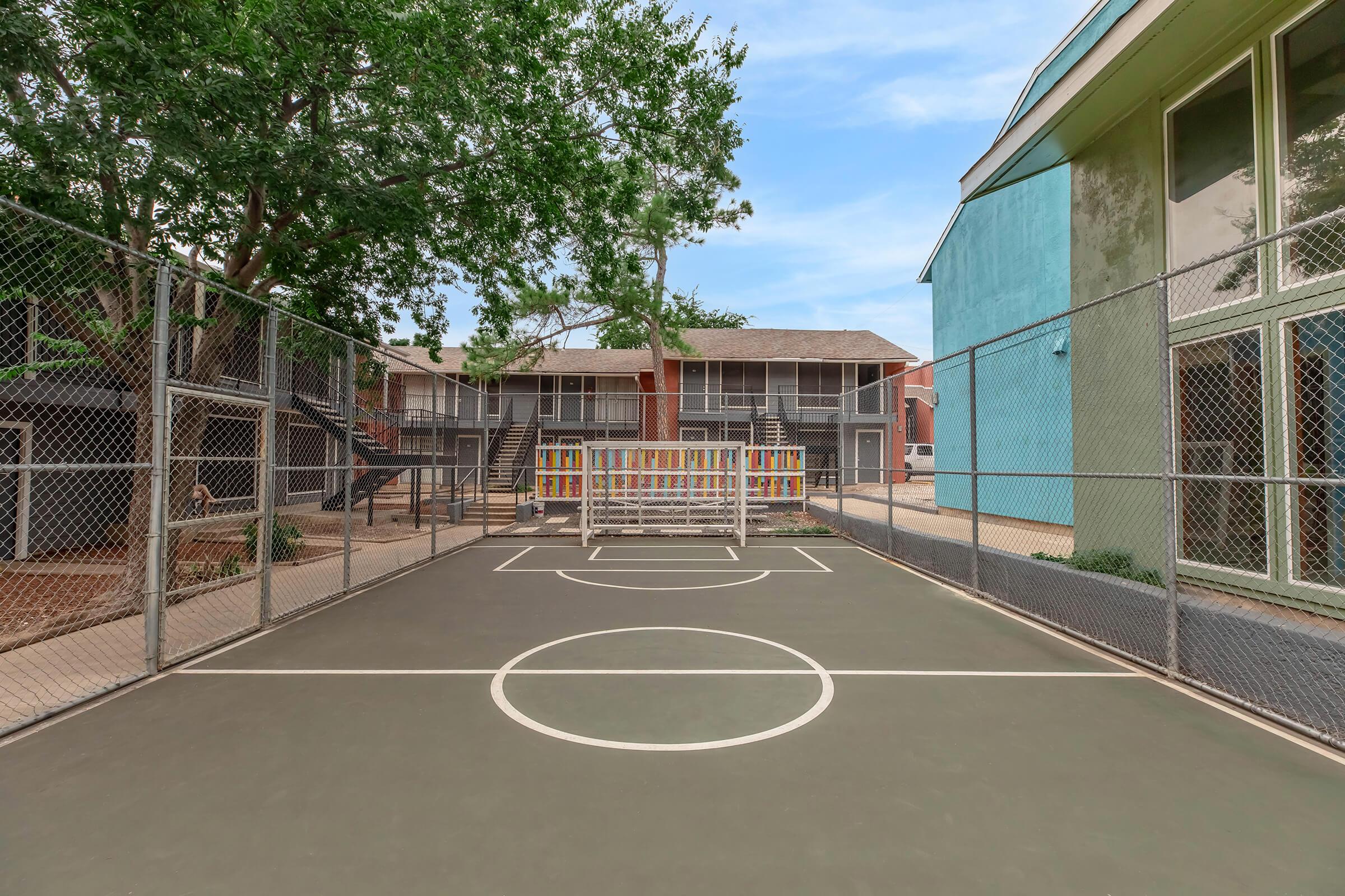 a building with a racket on a court