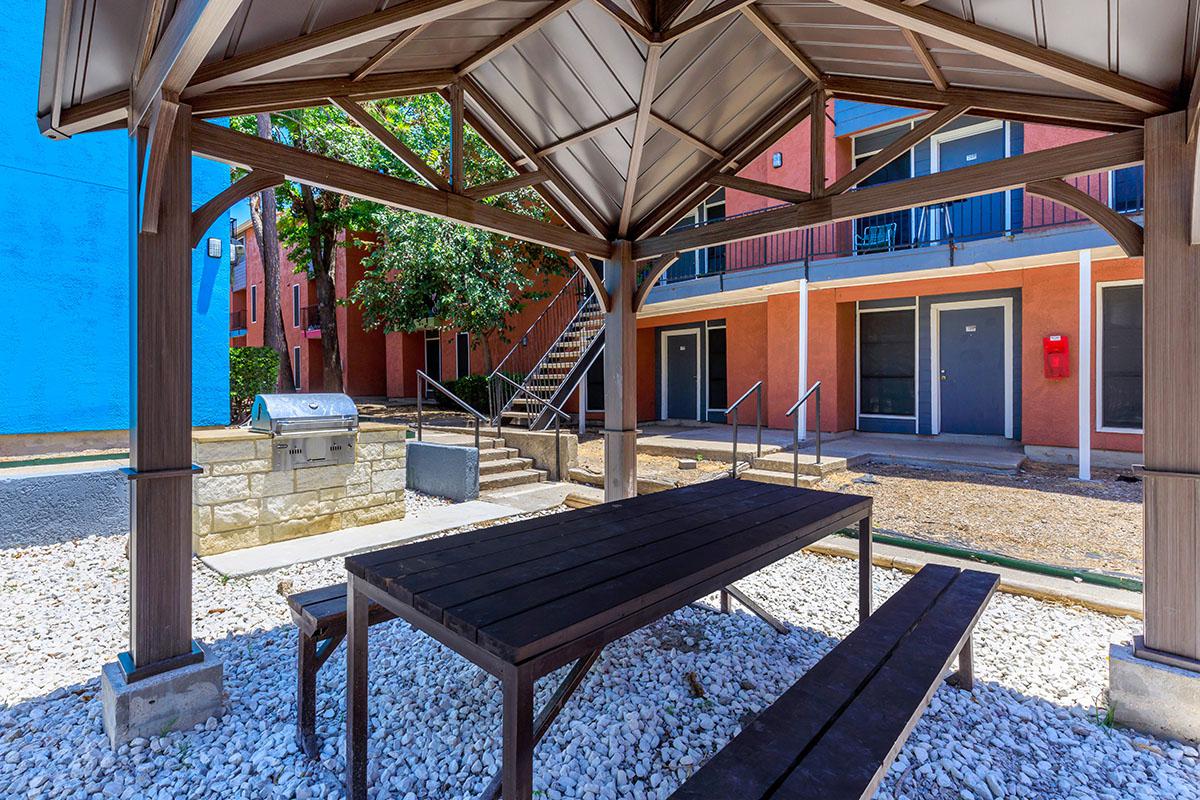 a bench in front of a building