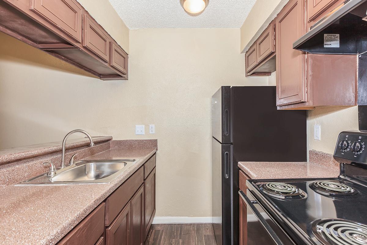 a modern kitchen with stainless steel appliances