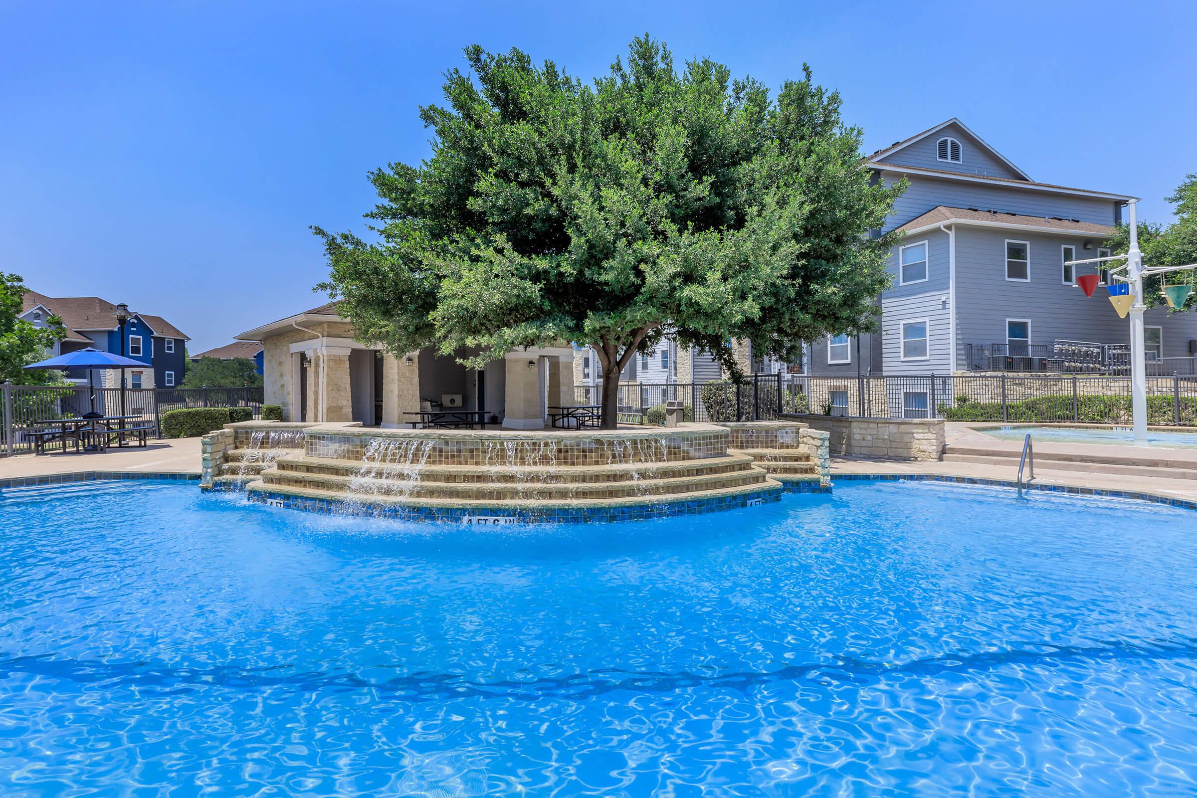 a small house in a pool of water