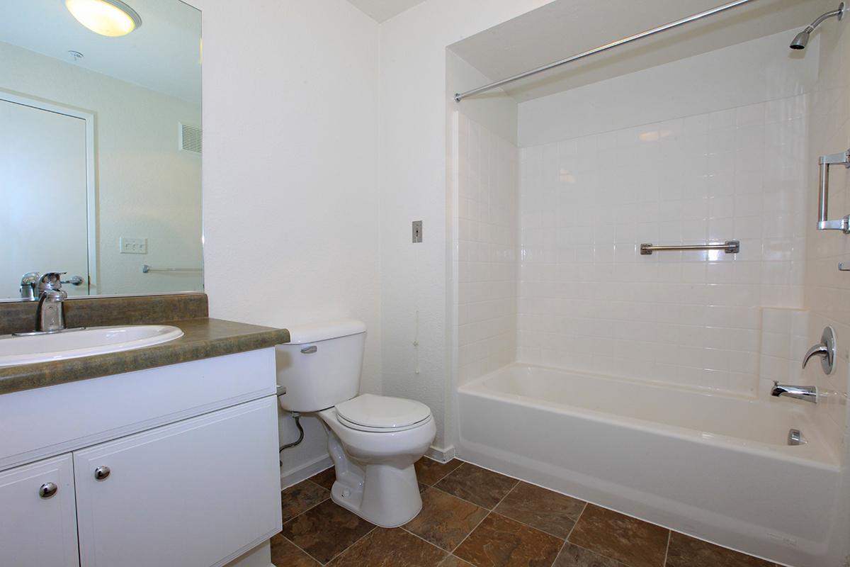 Bathroom with white cabinets