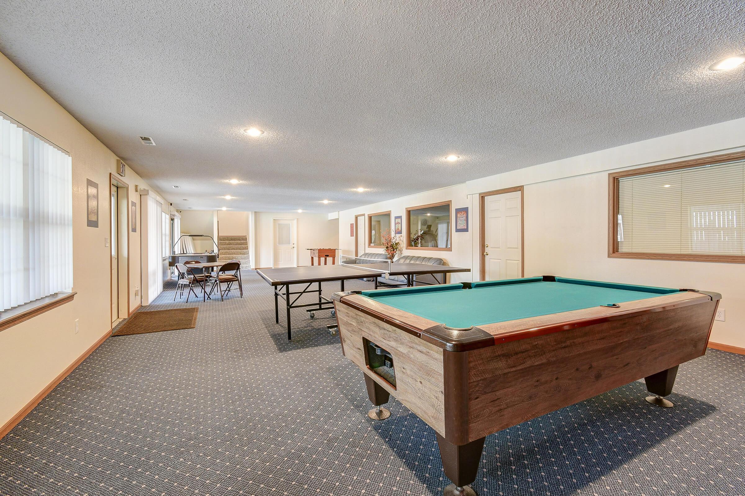 Clubhouse with Game Suite - Sunnyside Garden Apartments - Blue Spring - Missouri