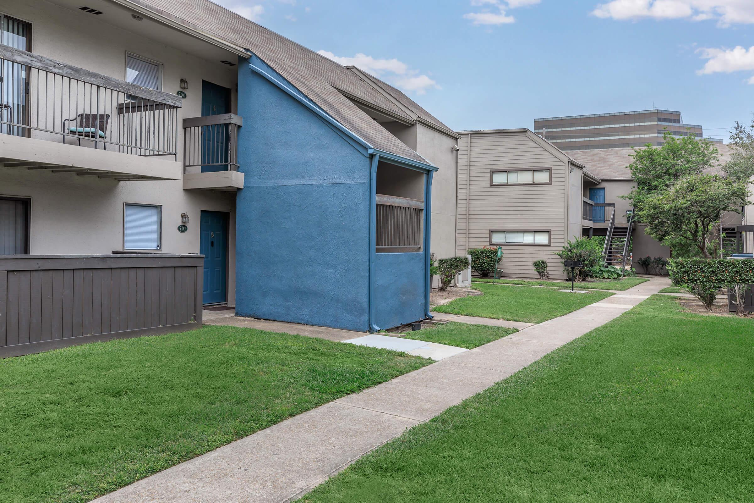 a large lawn in front of a house