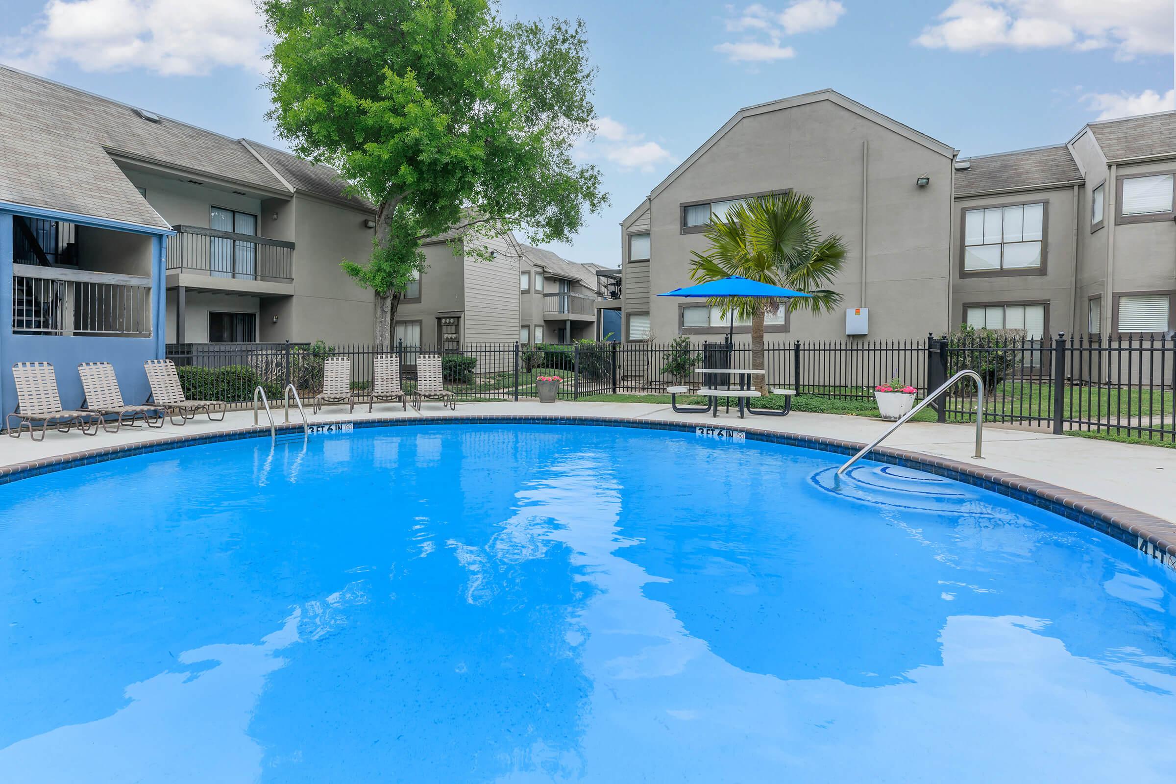 a house with a large pool of water