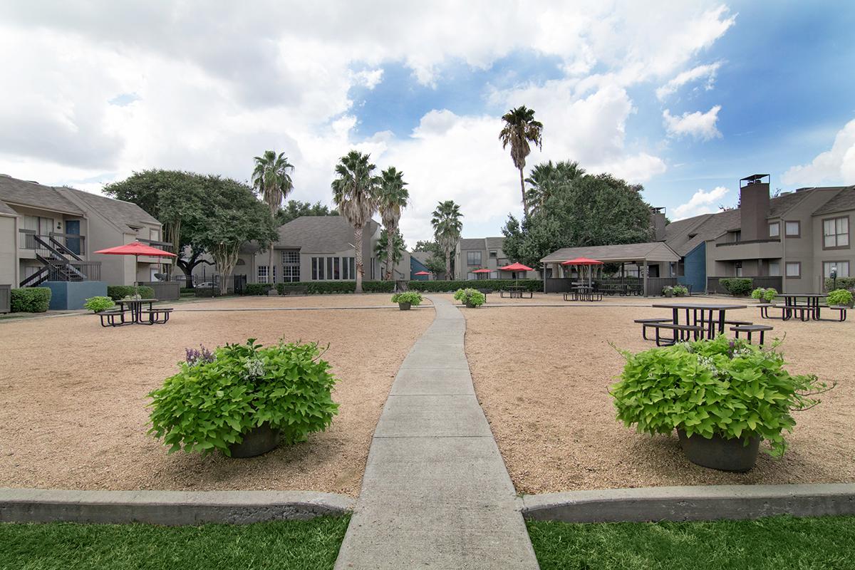 a garden in front of a building