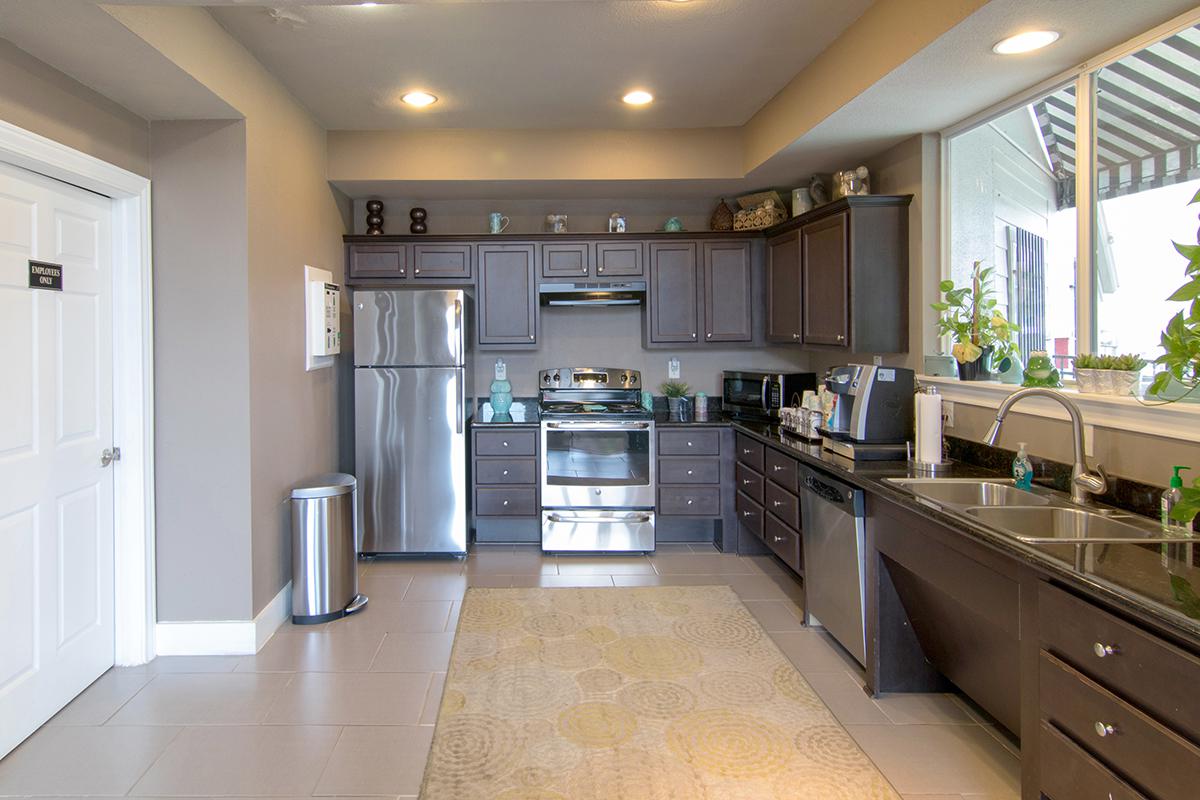 a modern kitchen with stainless steel appliances