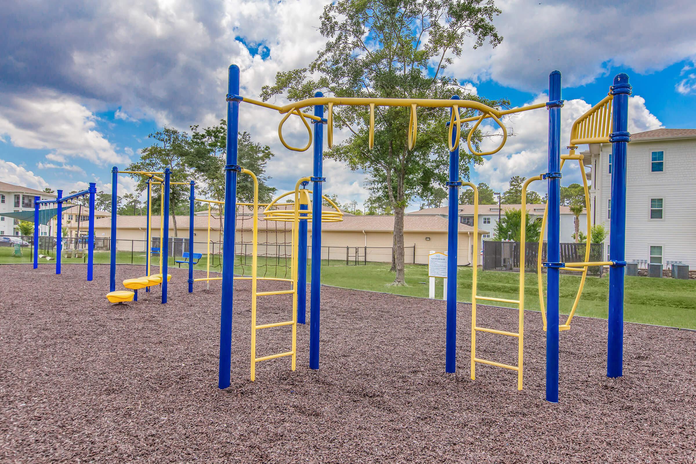 a playground inside a fence