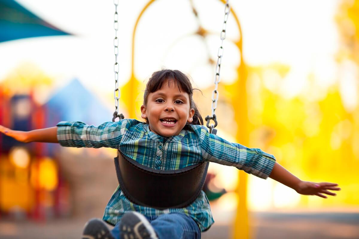 a young girl in a blue shirt