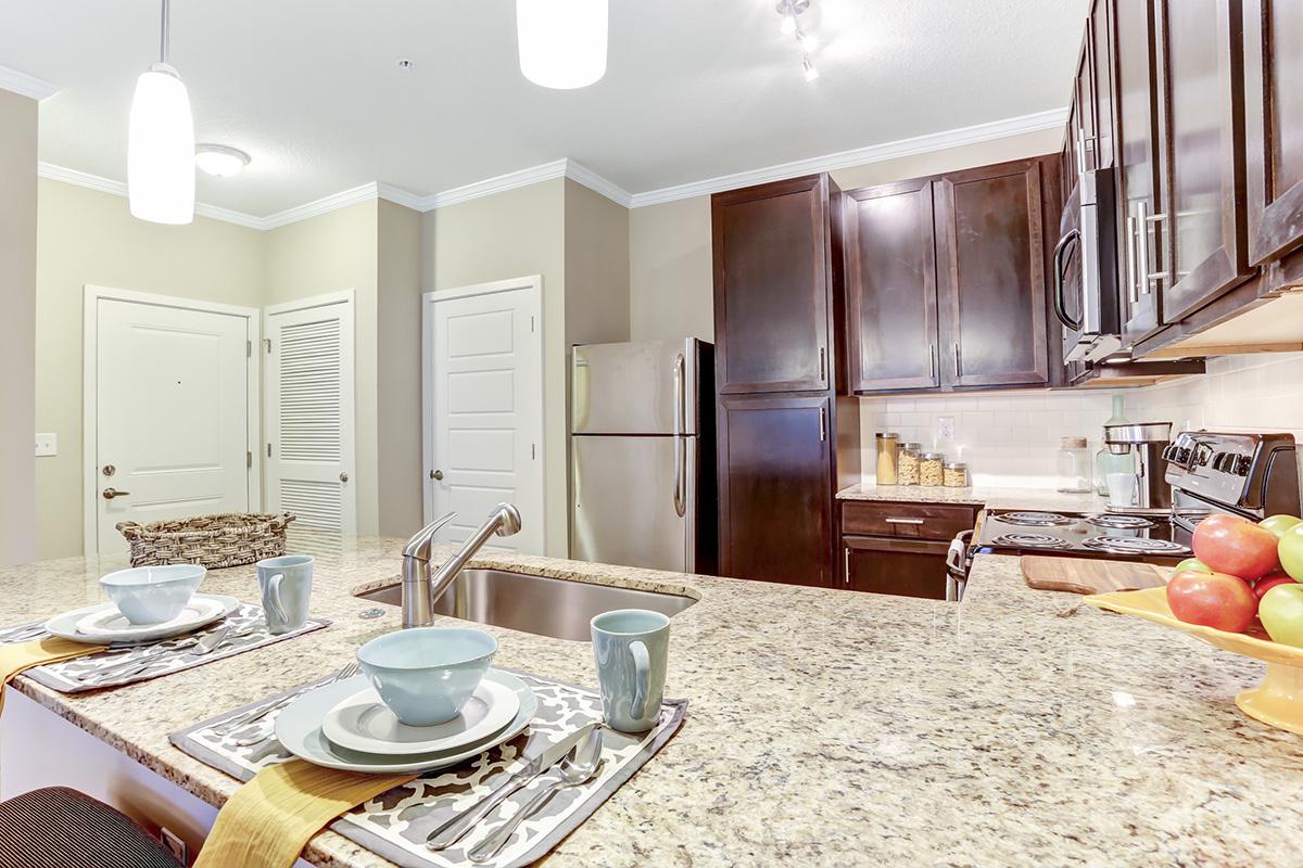 a kitchen with a dining table