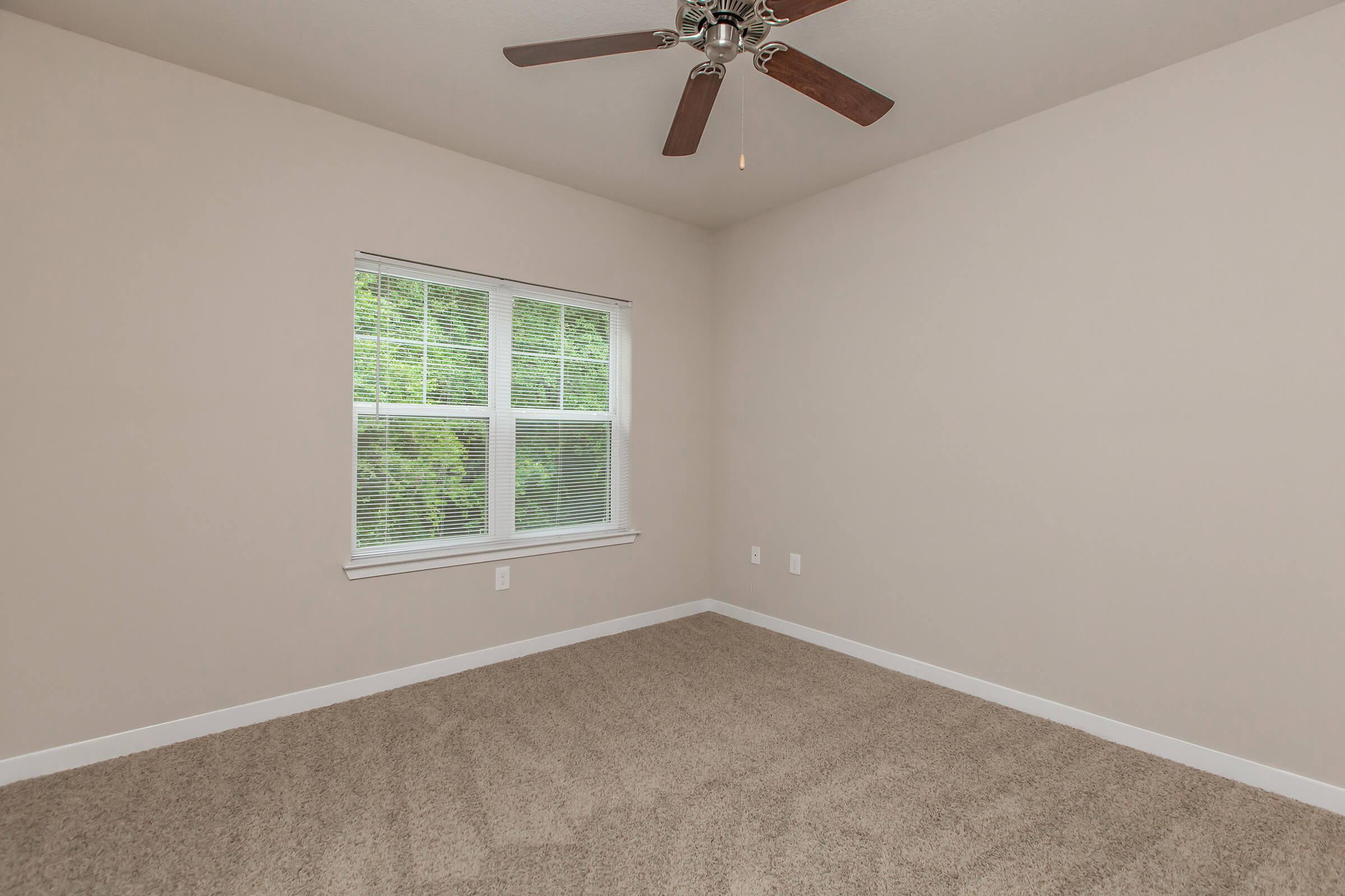 a room with a sink and a window