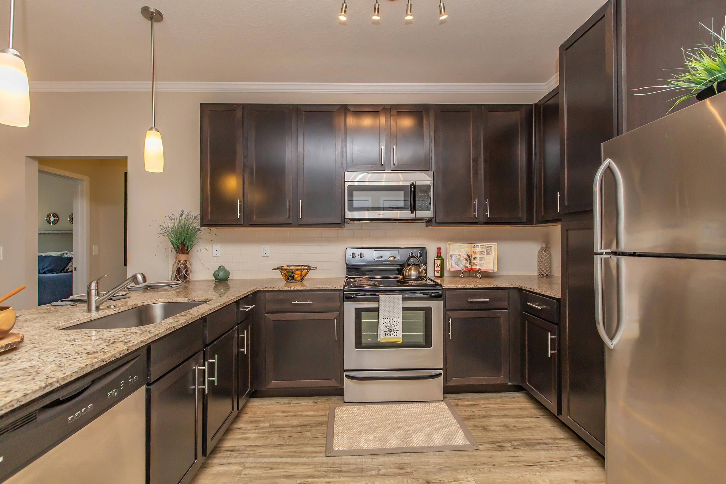 a modern kitchen with stainless steel appliances