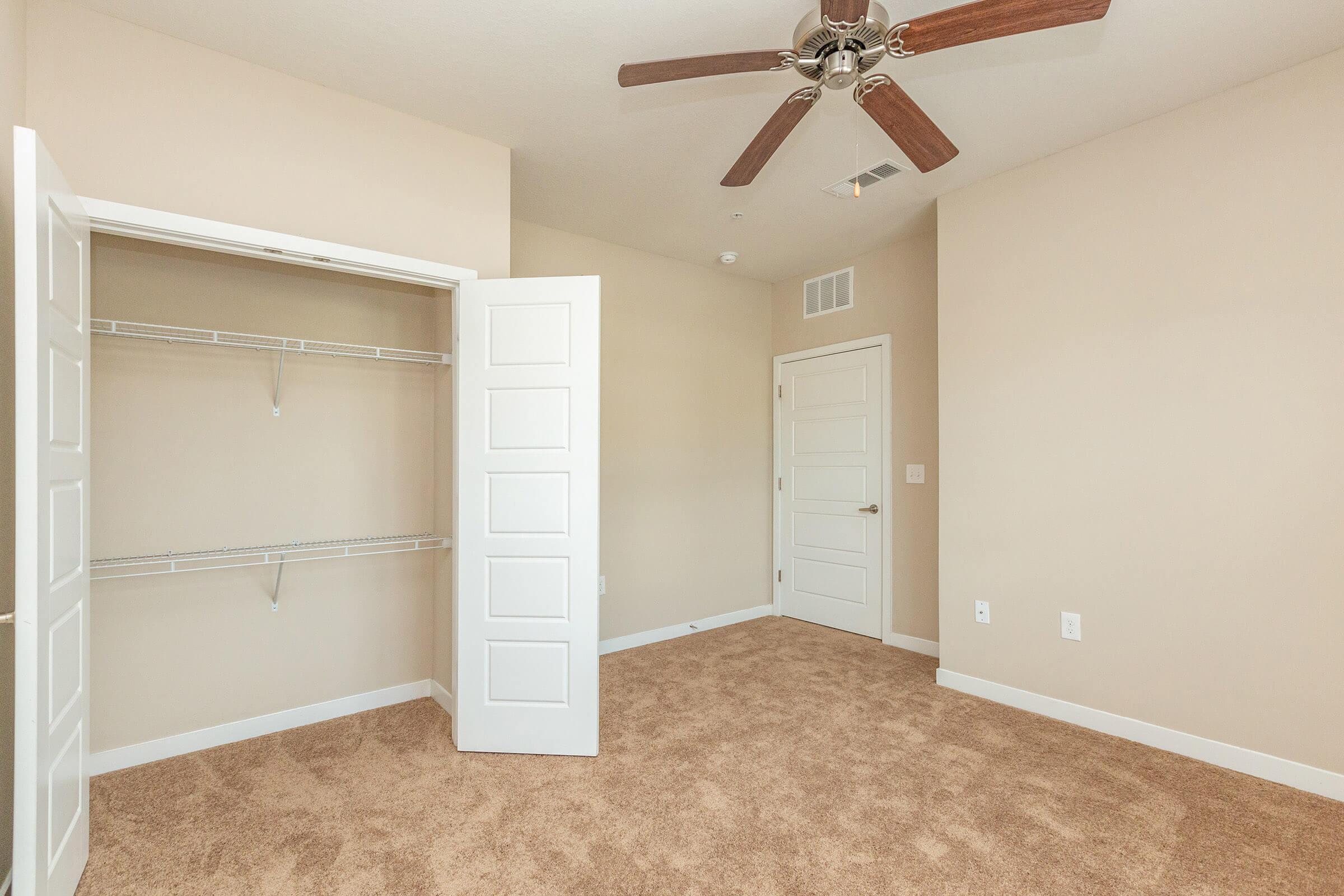 a white refrigerator freezer sitting in a room