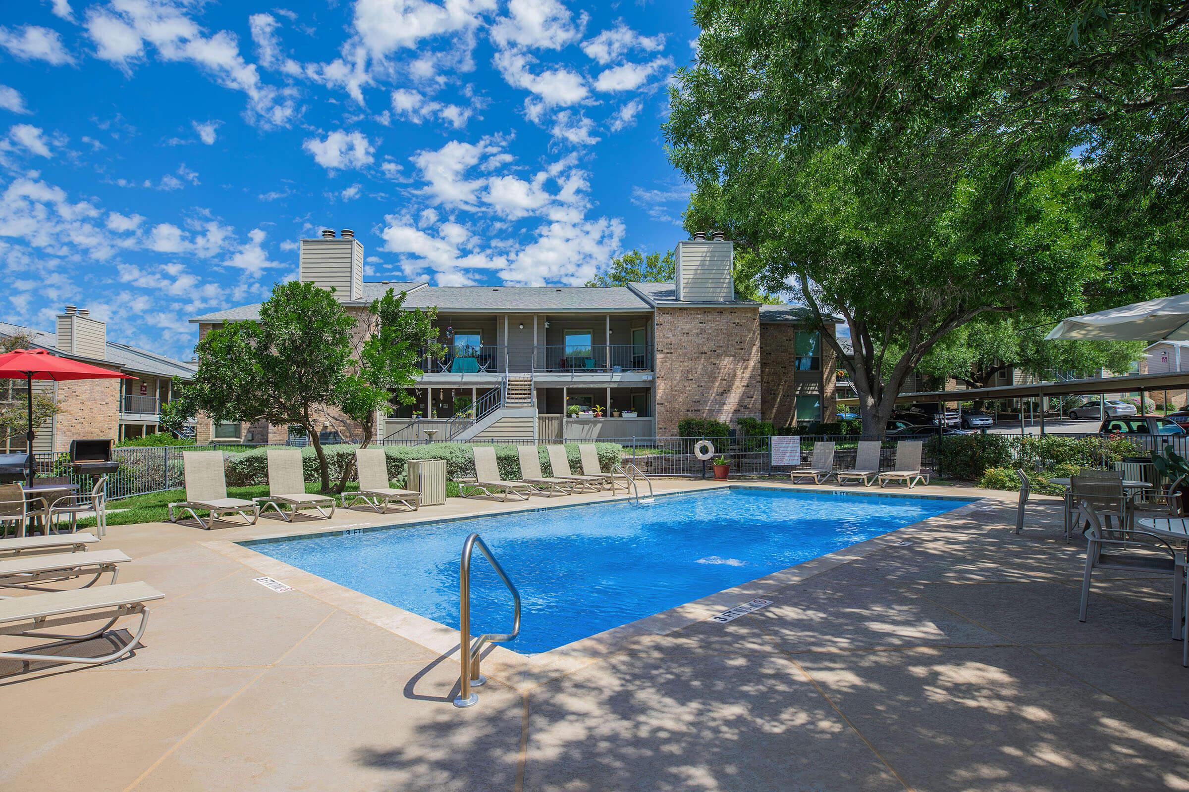 a pool next to a building