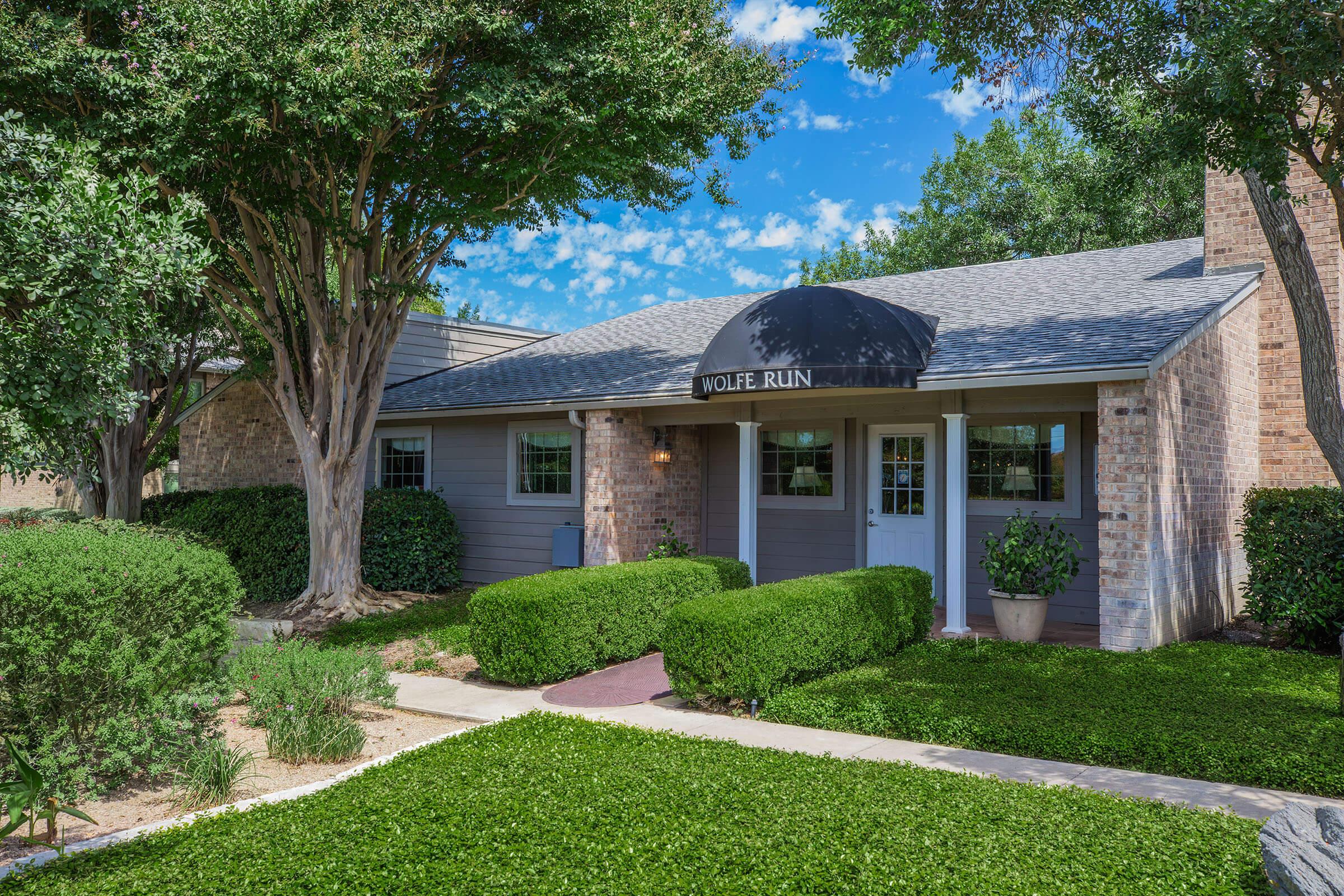 a large lawn in front of a house