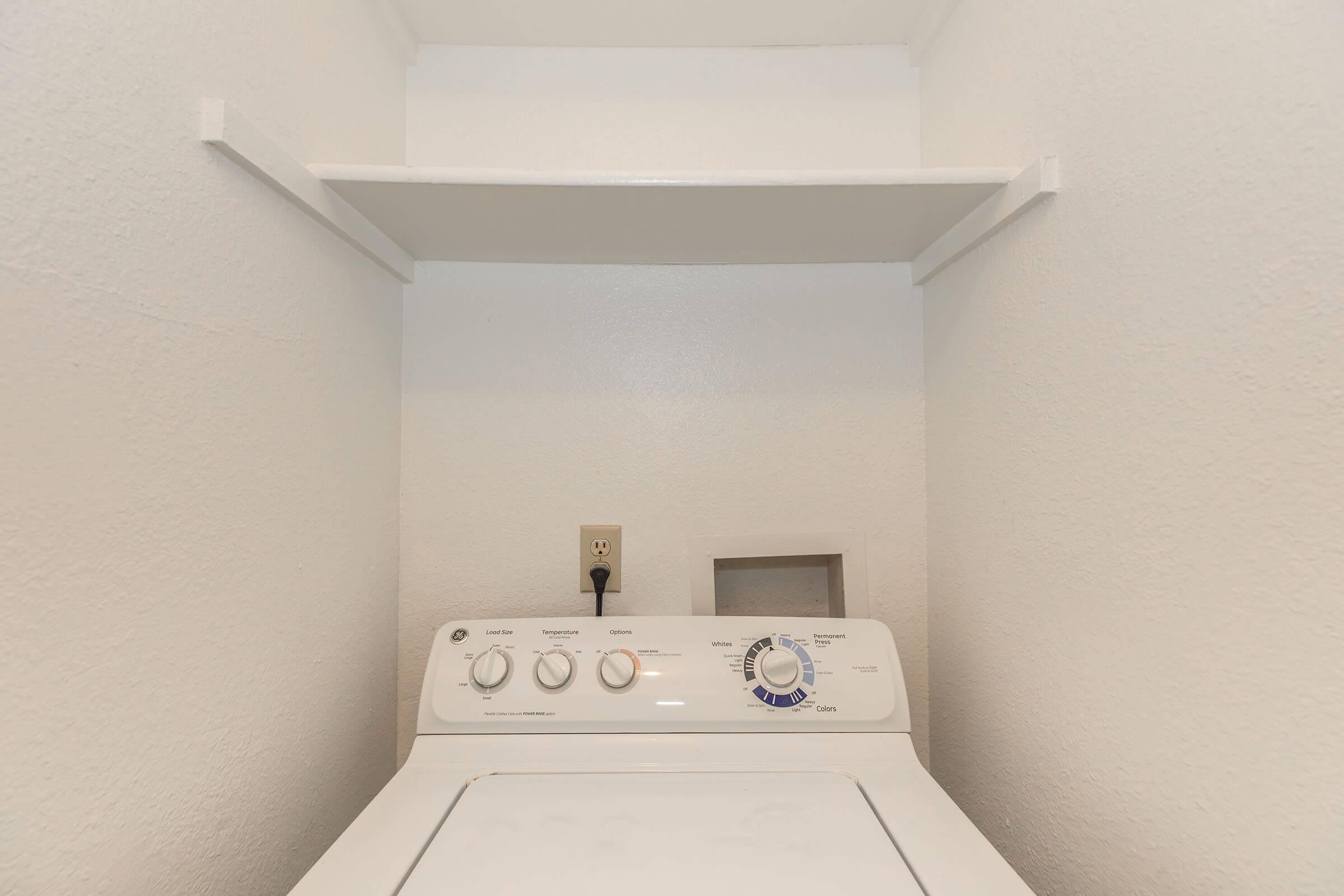 a view of a bedroom next to a sink