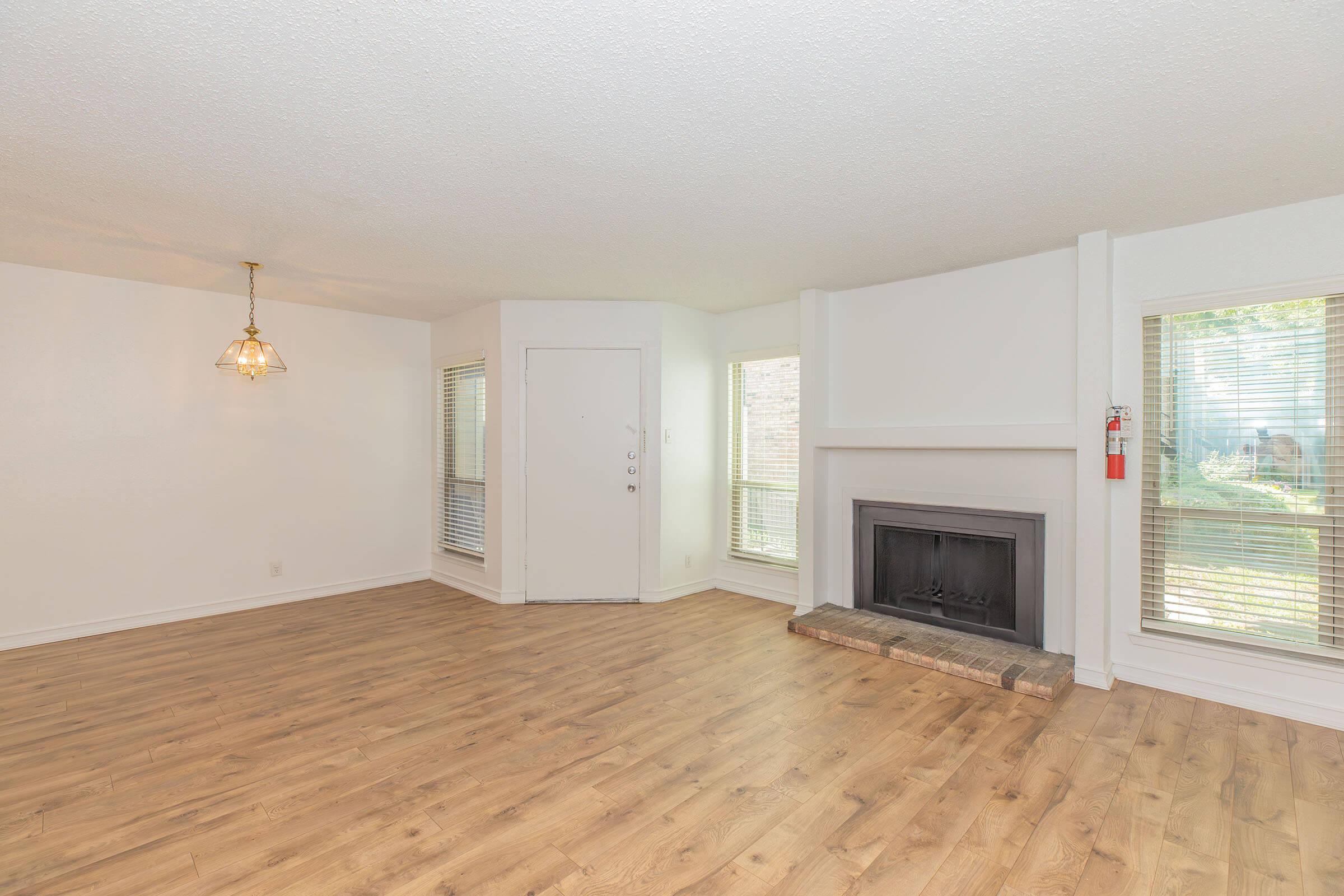 a living room with a wood floor