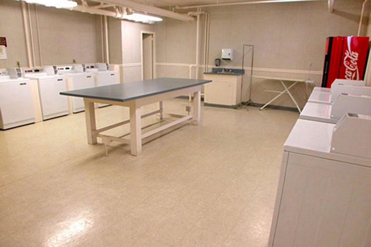 a kitchen with a table in a room