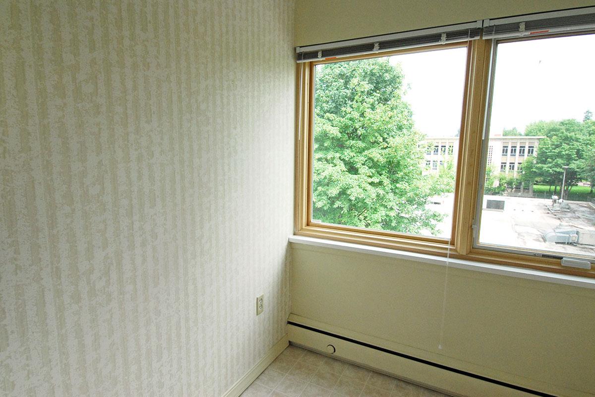 a room with a sink and a window