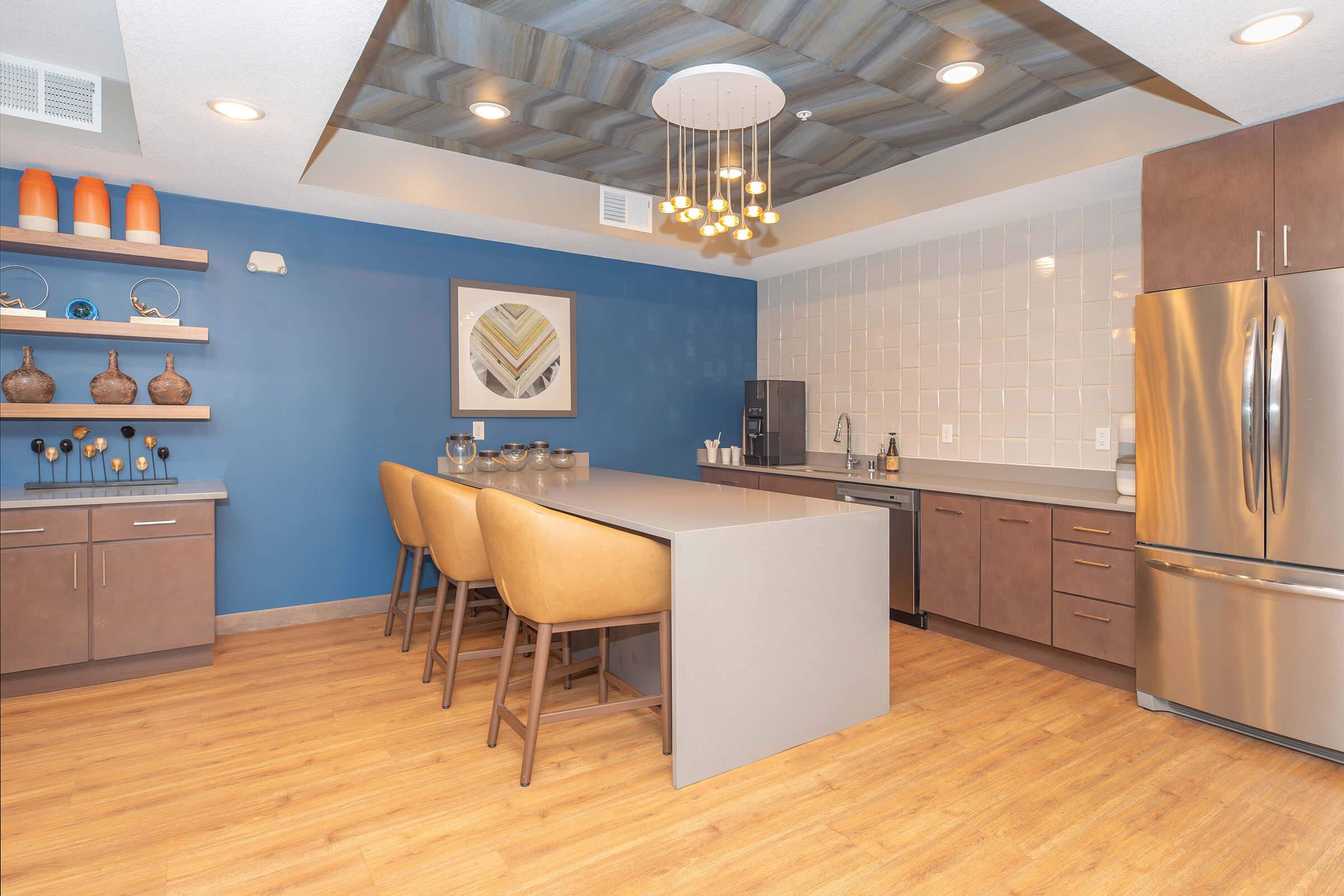 a kitchen with a wood floor