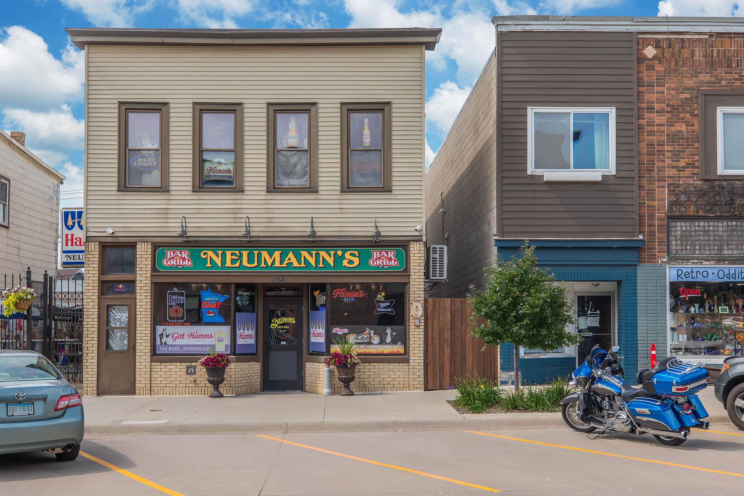 a bicycle parked on a street in front of a building