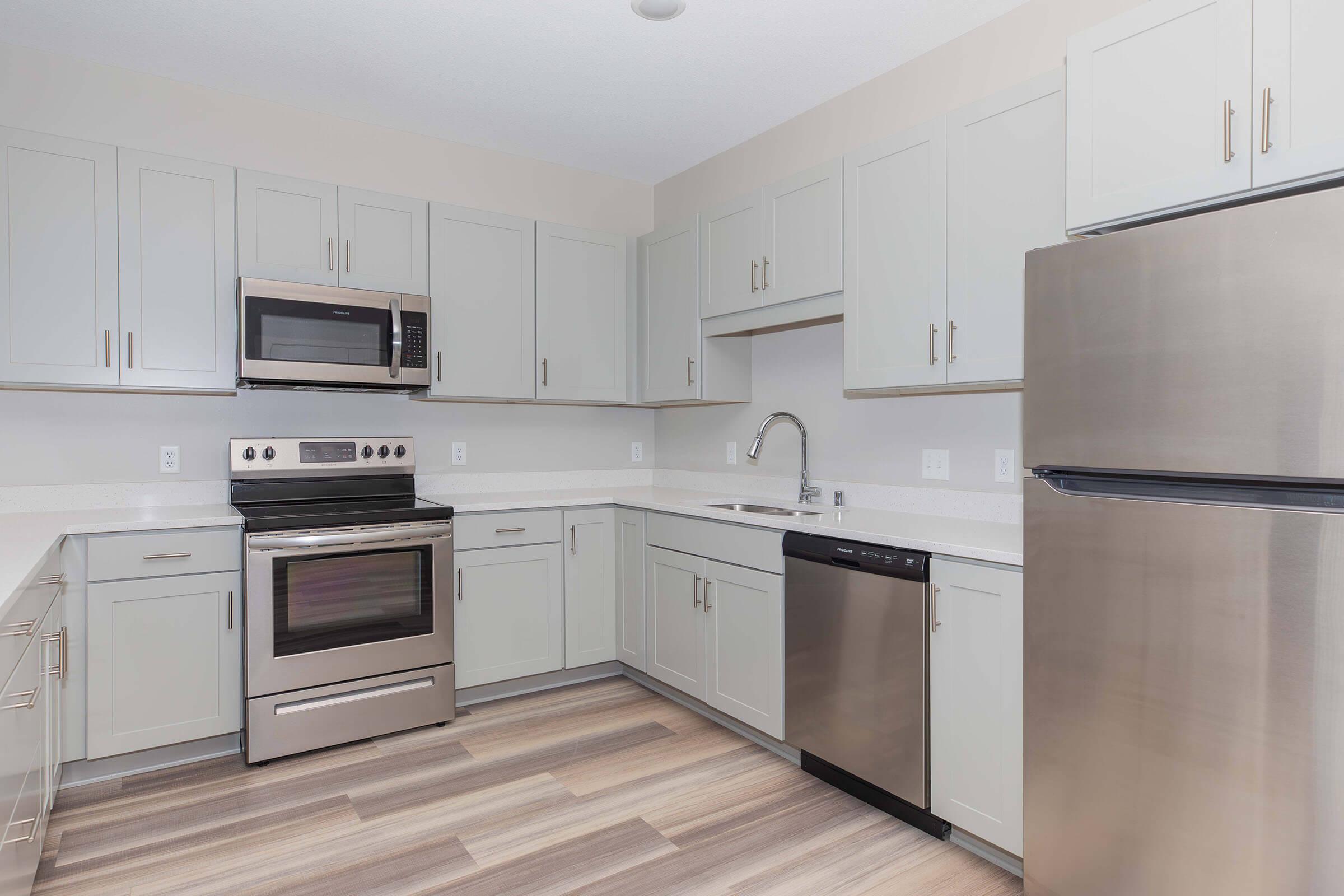 a kitchen with stainless steel appliances