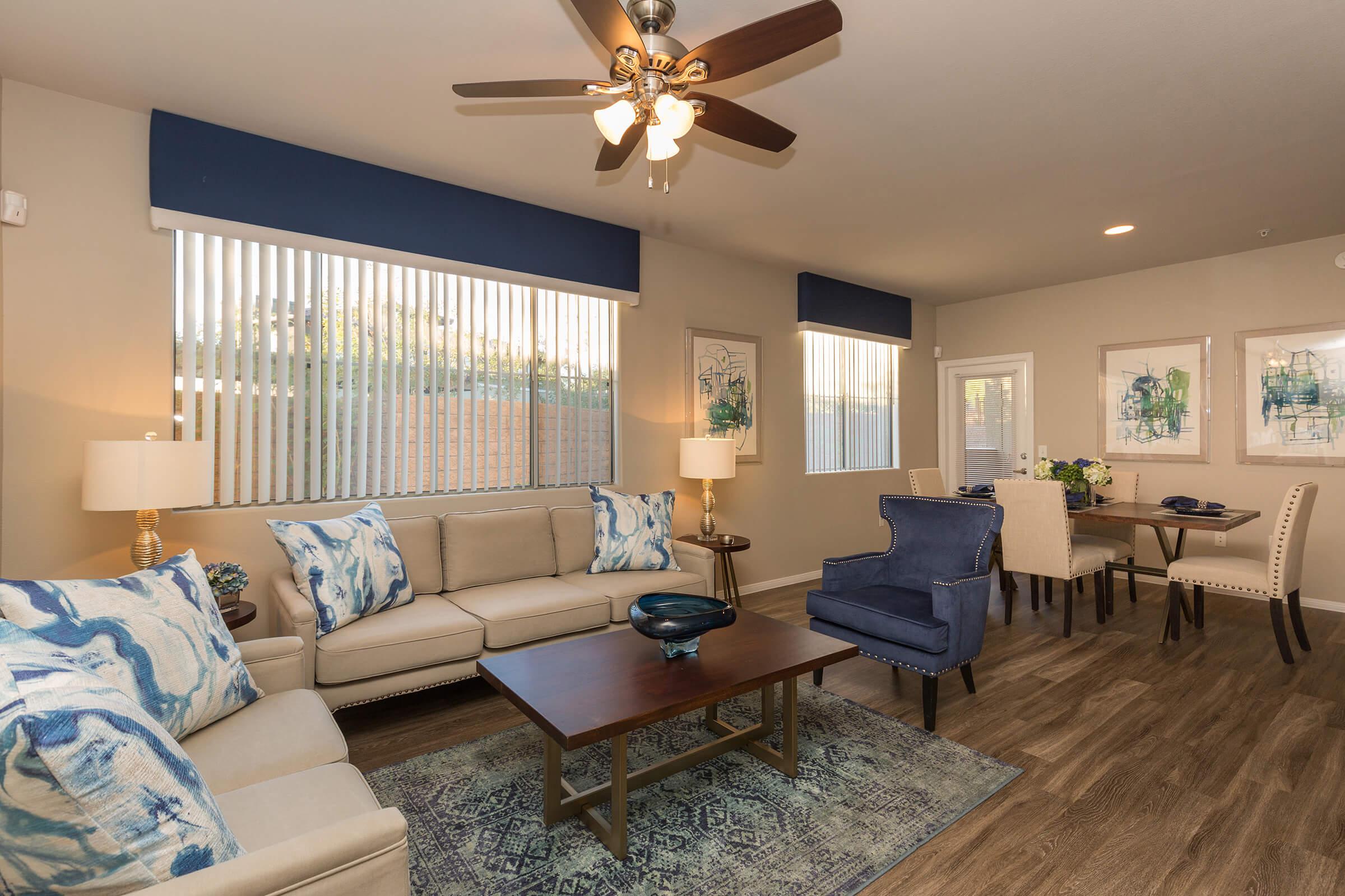 Your New Living Room at The Pavilions At Providence Apartments