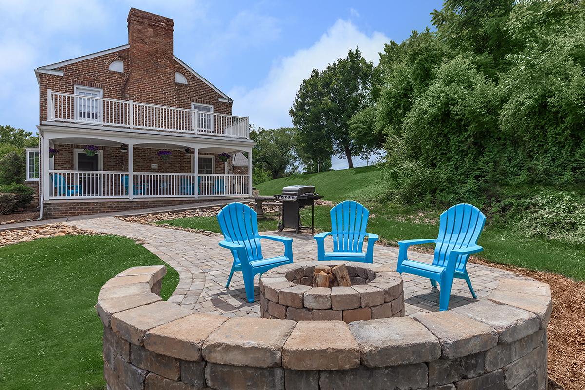 Fire pit by the pool at Waterford Village