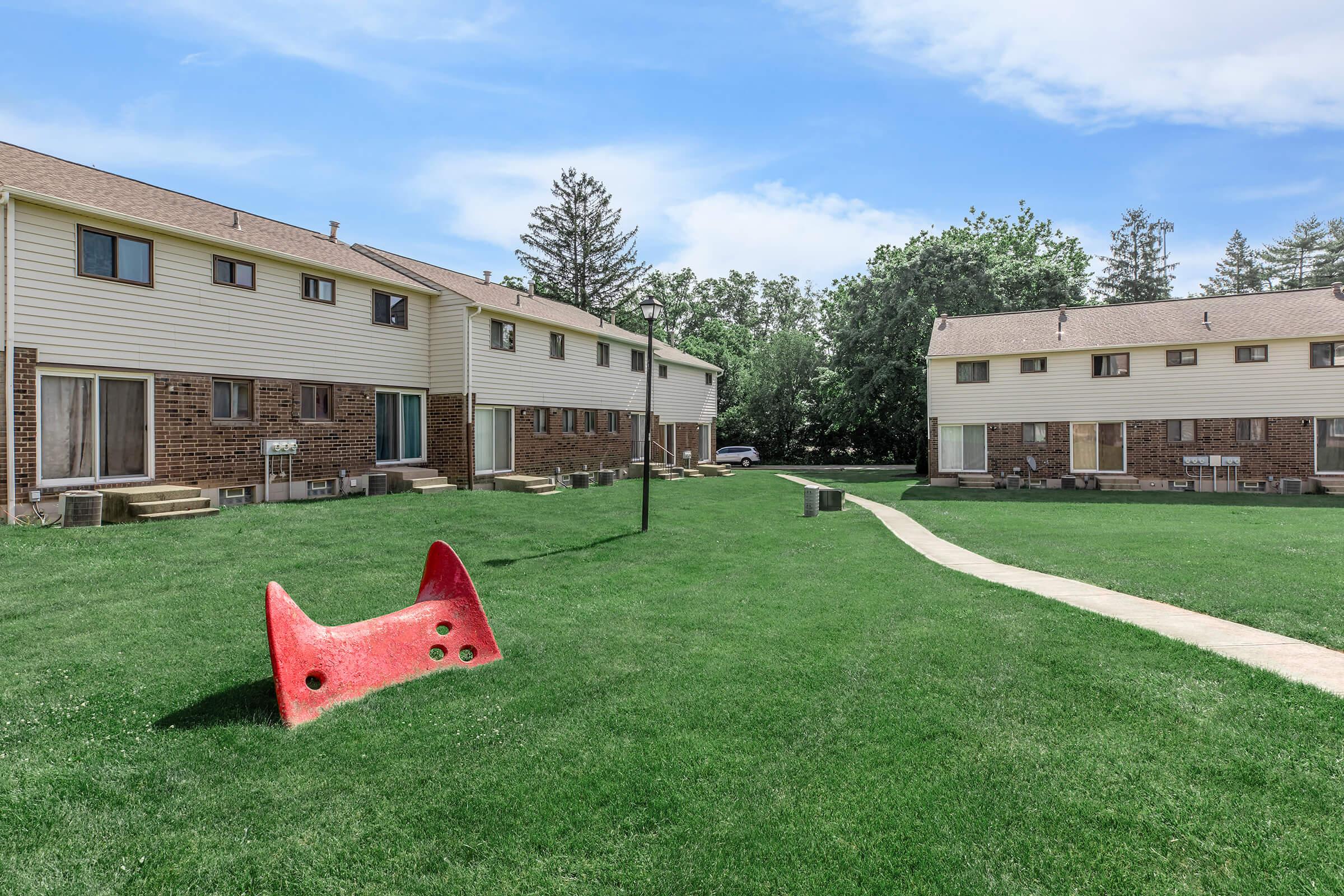 a large lawn in front of a house