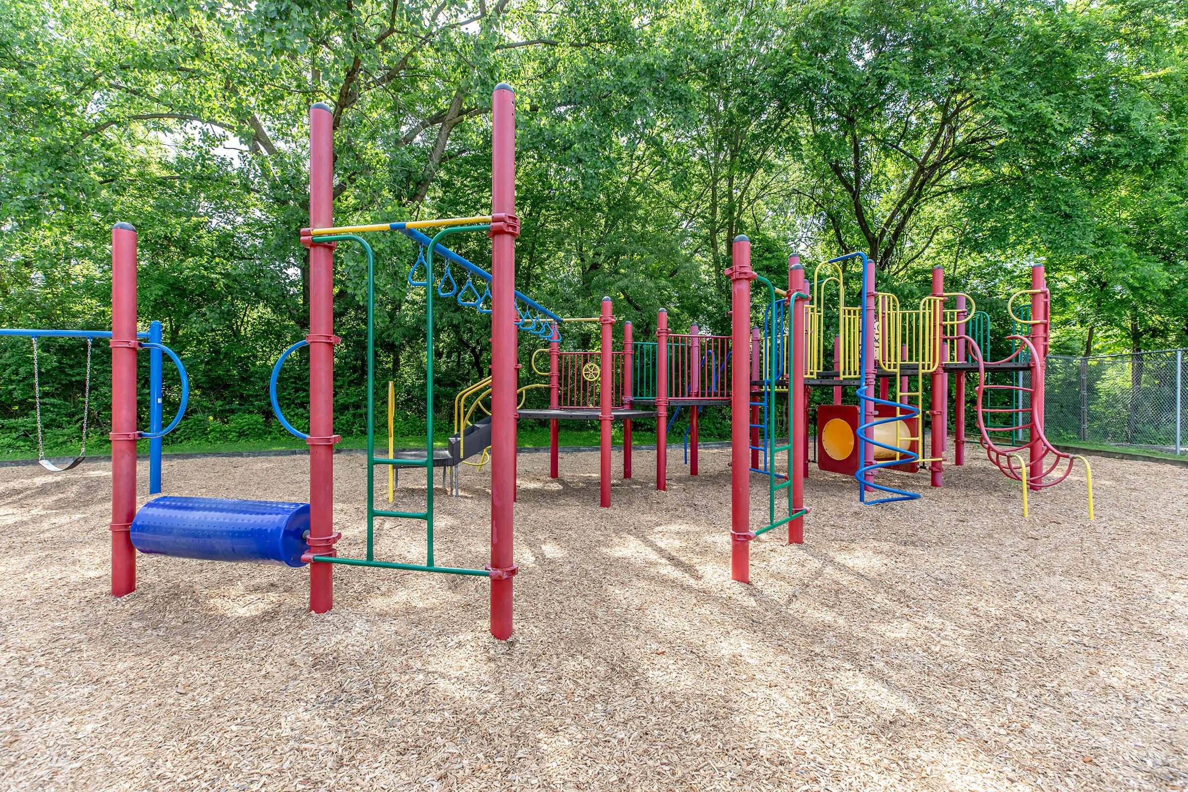 a playground inside a fence