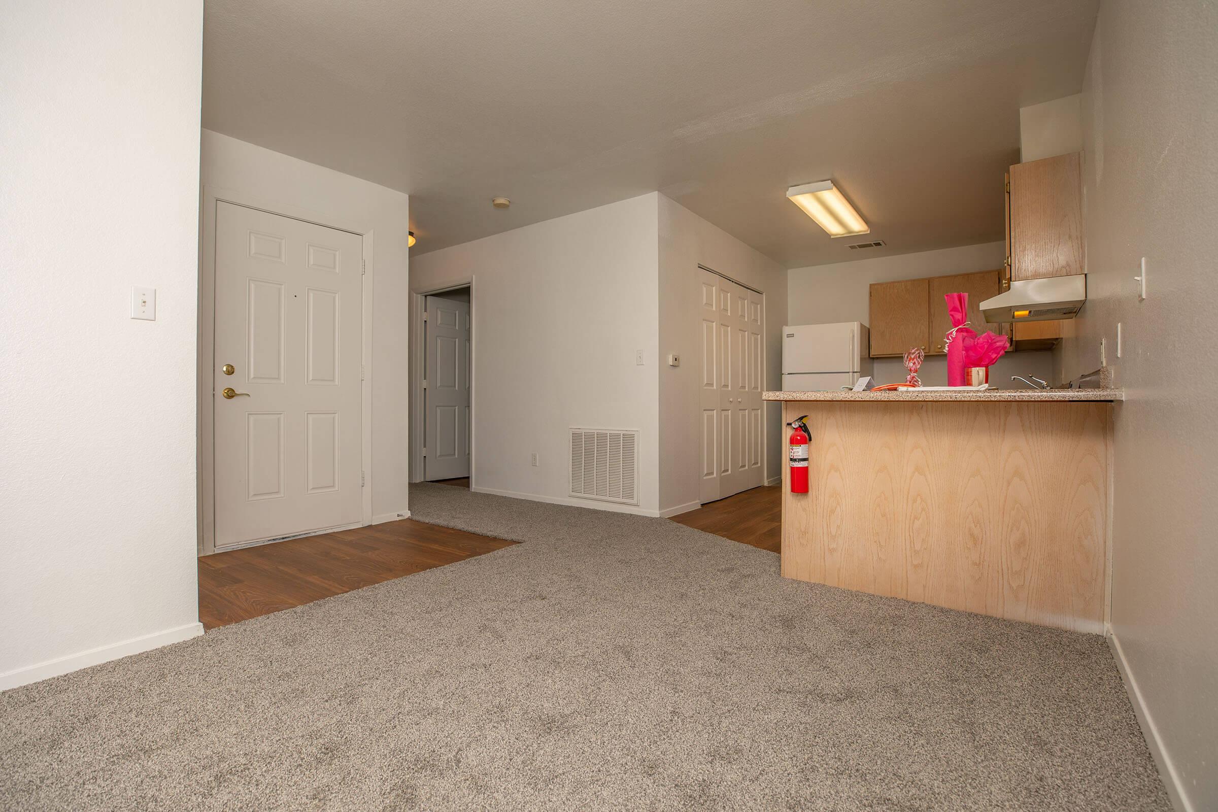 a refrigerator in a small room