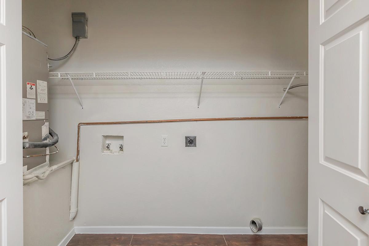 a white refrigerator freezer sitting inside of a kitchen