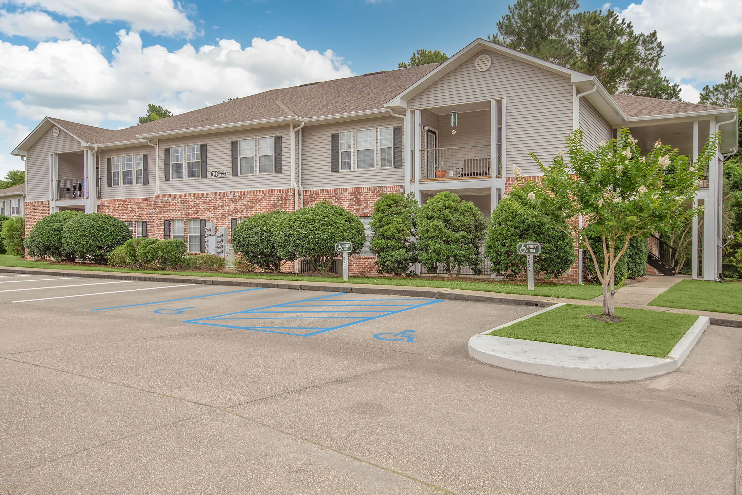 a small house in a parking lot