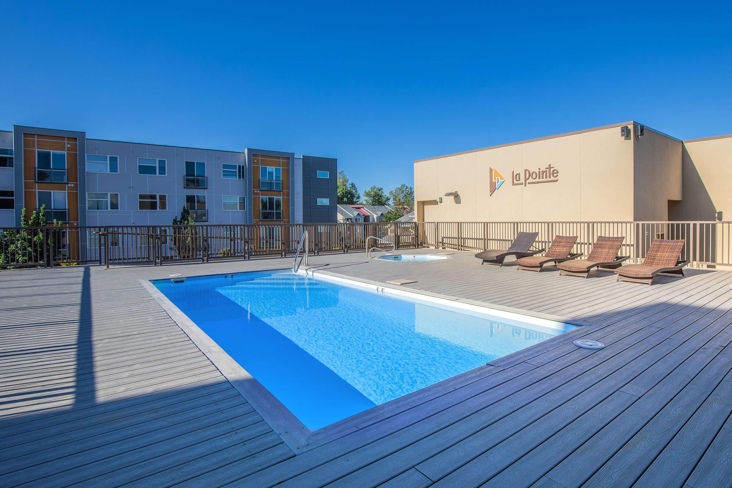 a pool next to a building