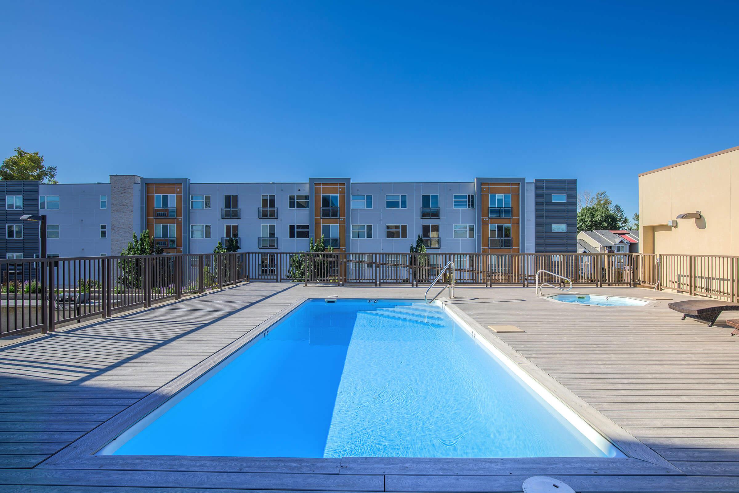 a pool next to a building