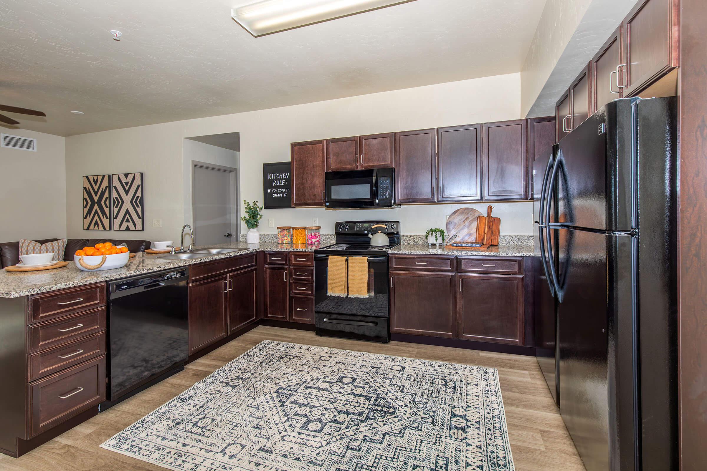 a modern kitchen with stainless steel appliances