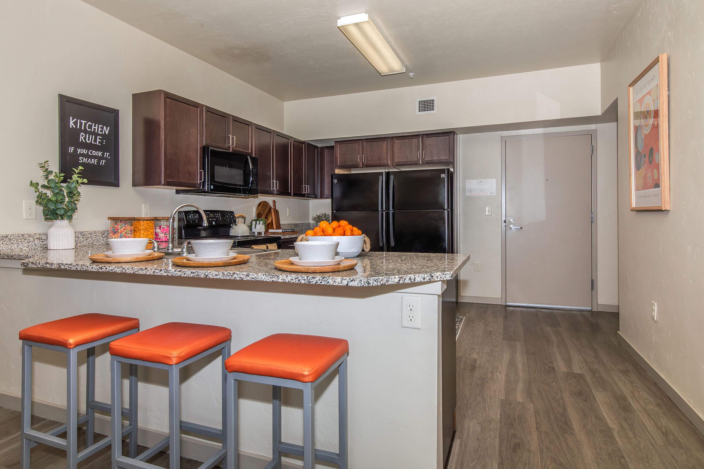 a kitchen with a dining table