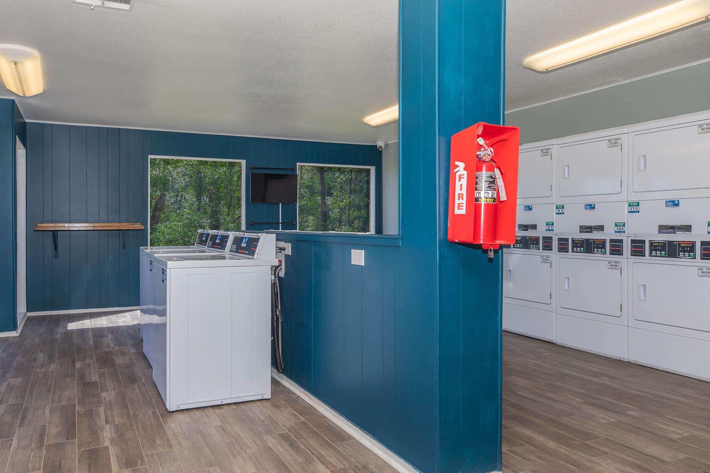 a kitchen with a blue door