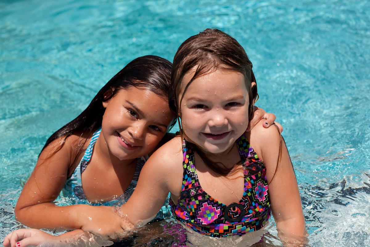 a girl in a pool of water