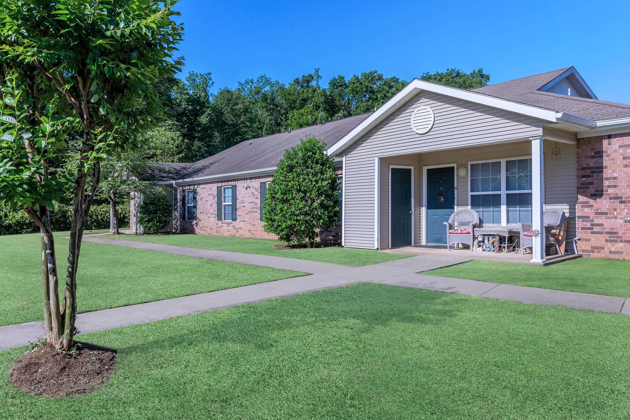 a large lawn in front of a house