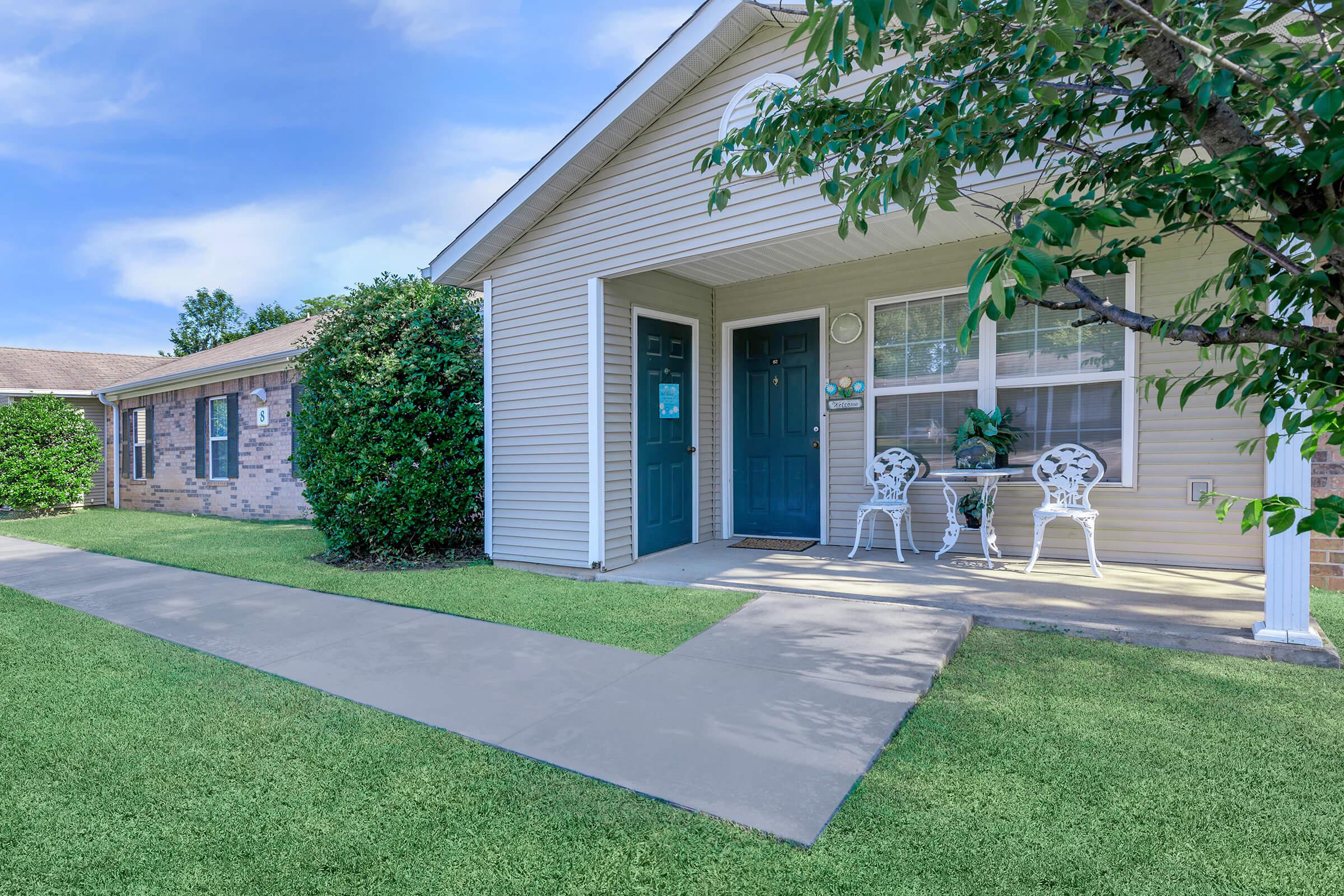 a large lawn in front of a house