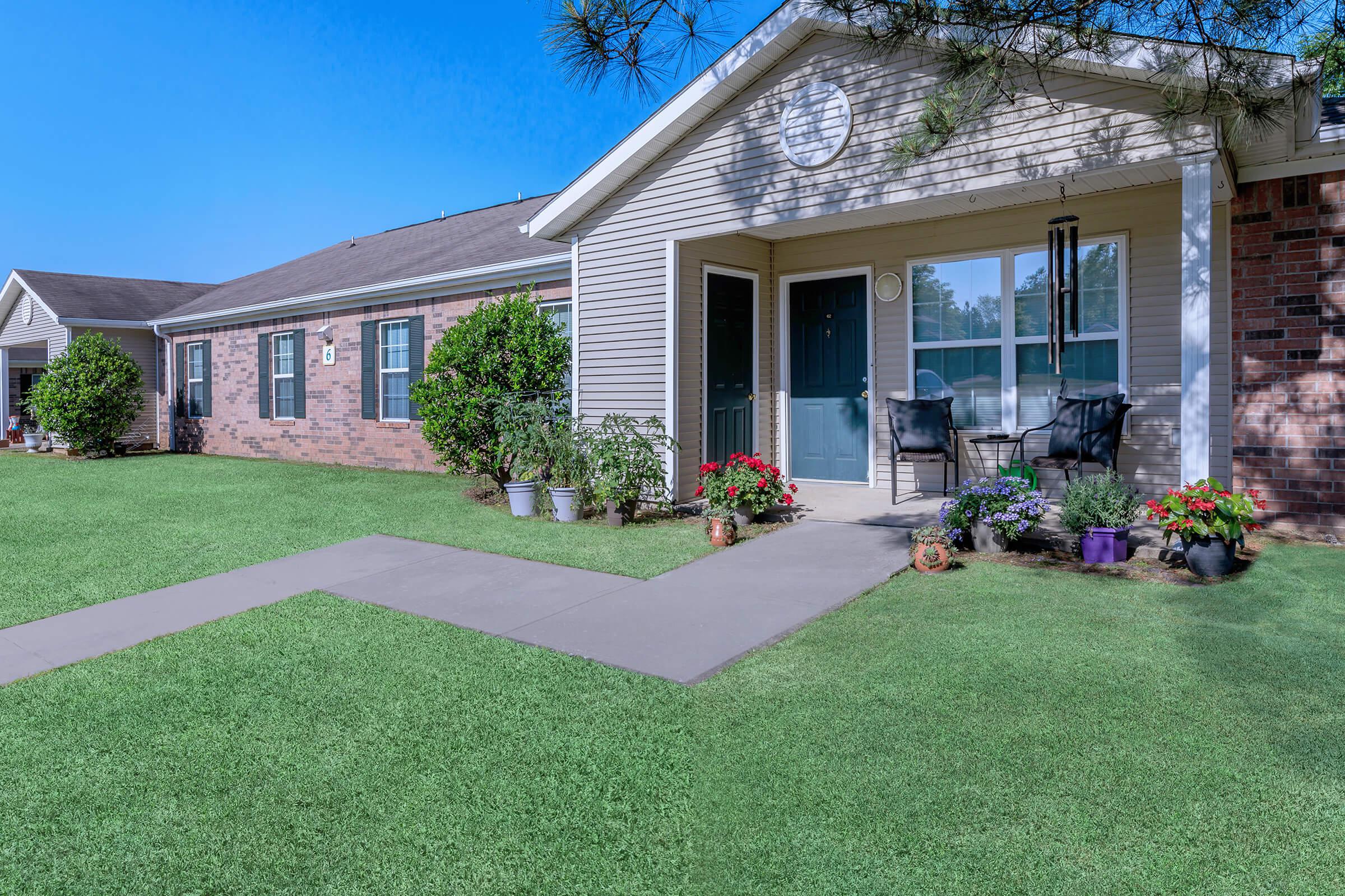 a large lawn in front of a house