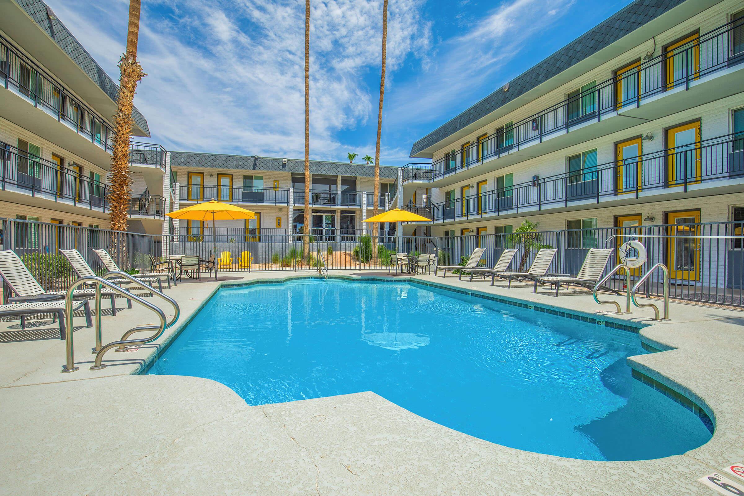 a pool next to a building