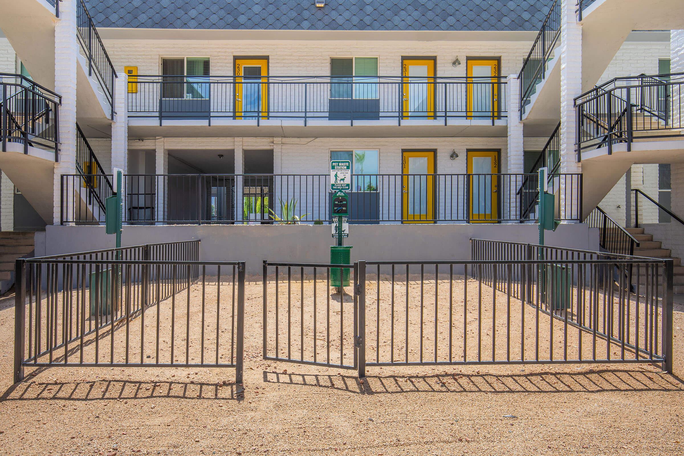 a close up of a fence in front of a building